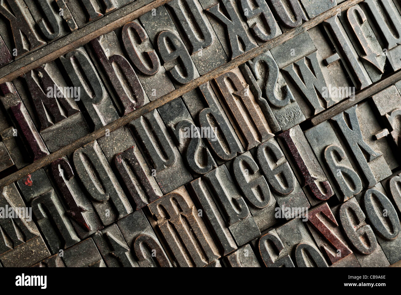 a tray of carved wooden letters, part of a letterpress set. Stock Photo
