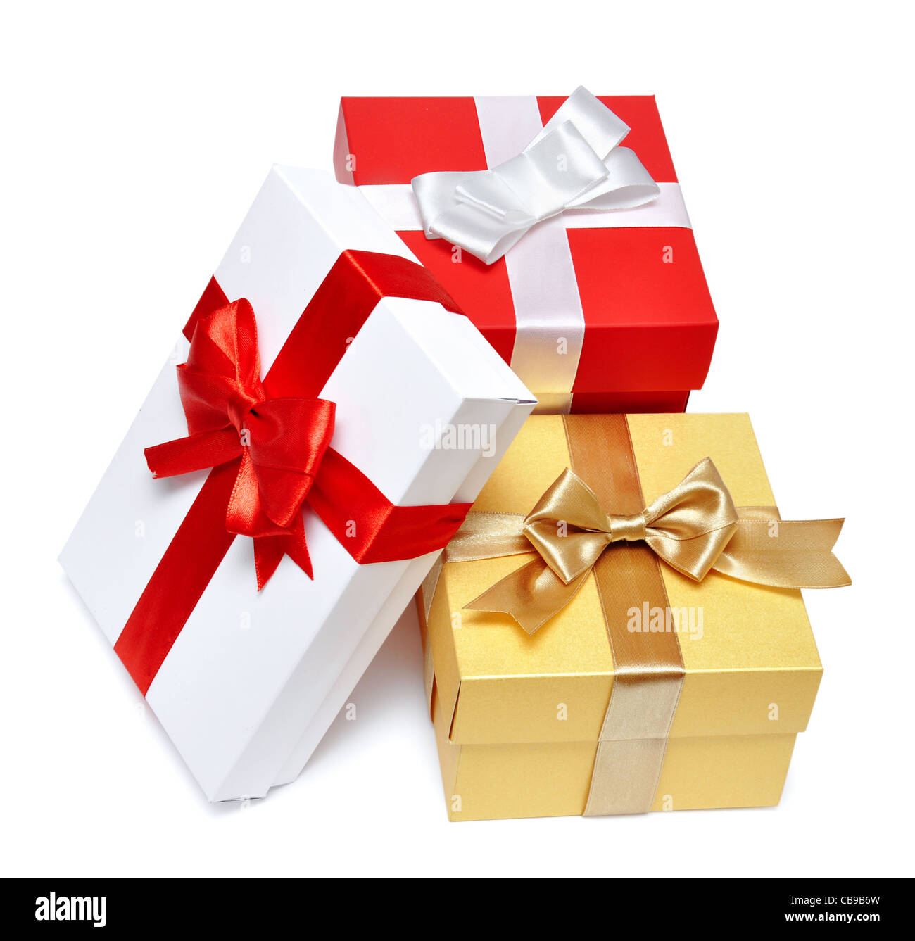 Holiday gift boxes decorated with ribbon isolated on white background