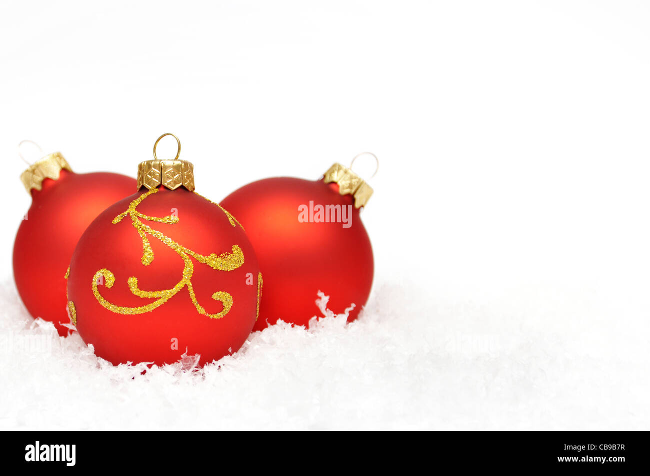 Red christmas ball in the snow hi-res stock photography and images - Alamy