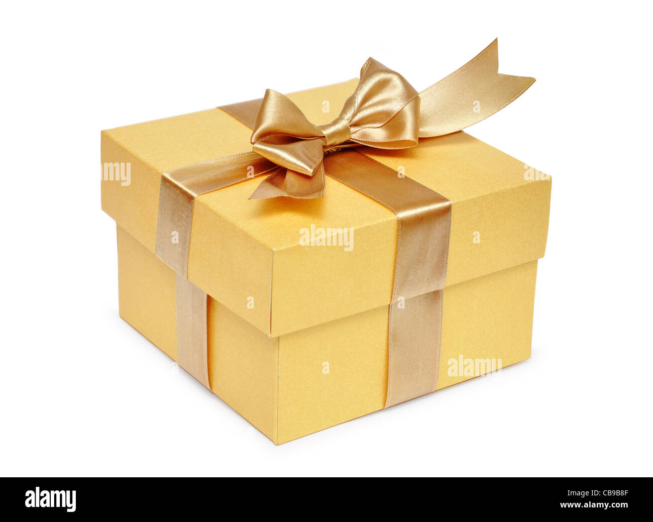 Golden gift box with golden ribbon over white background Stock Photo