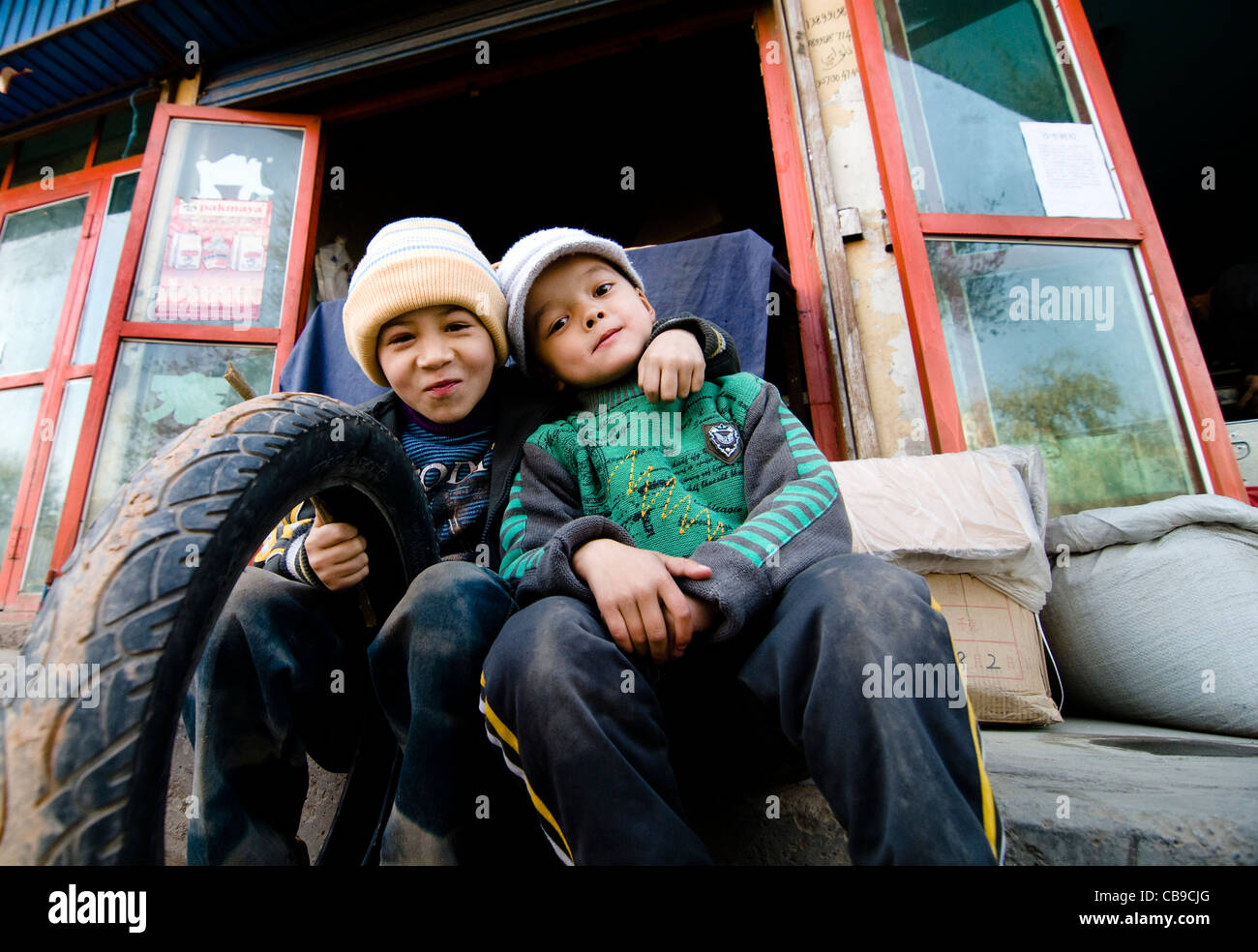 Uyghur children in the old city of Kashgar, Xinjiang, China. Stock Photo
