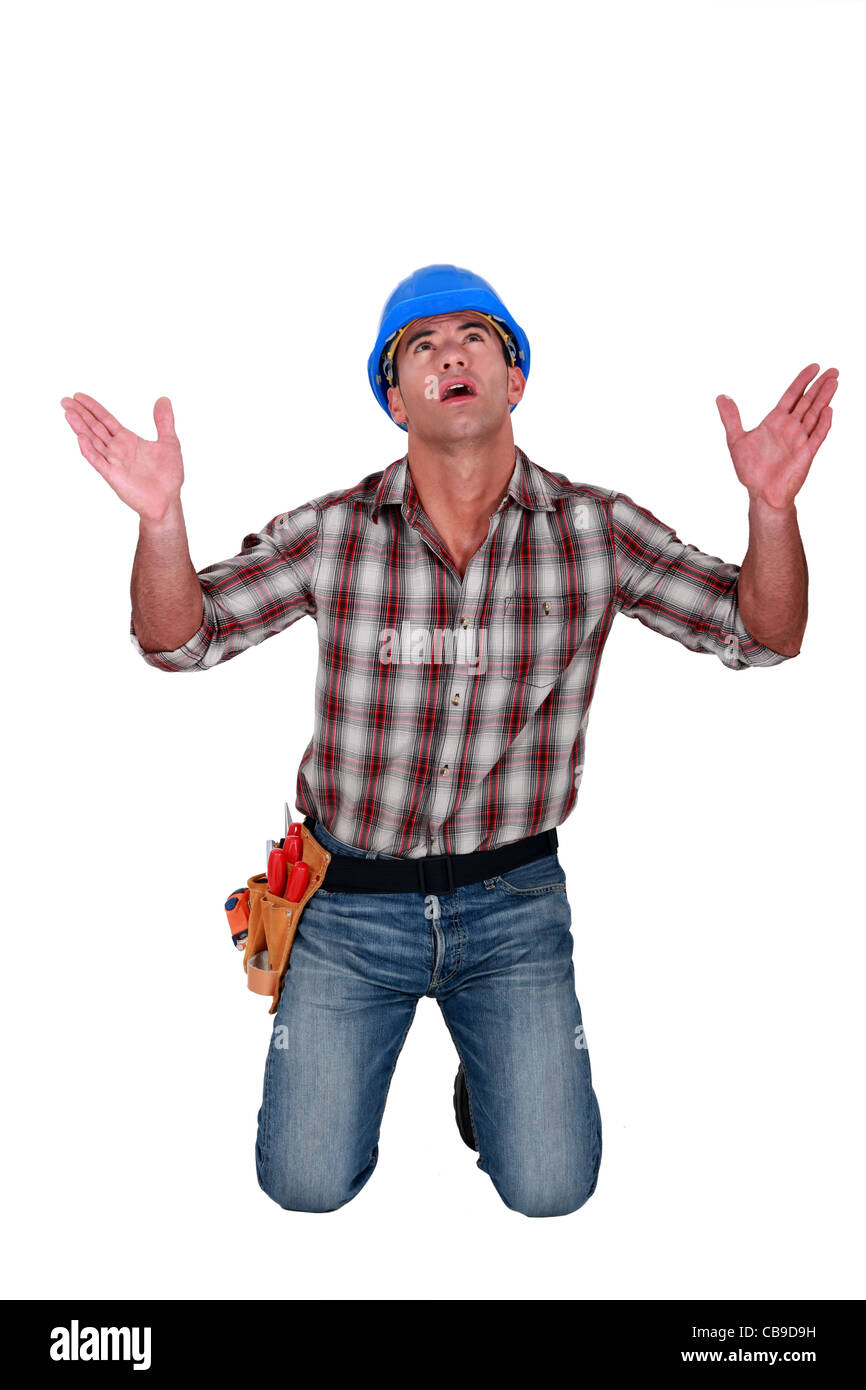 Man on knees beg hi-res stock photography and images - Alamy