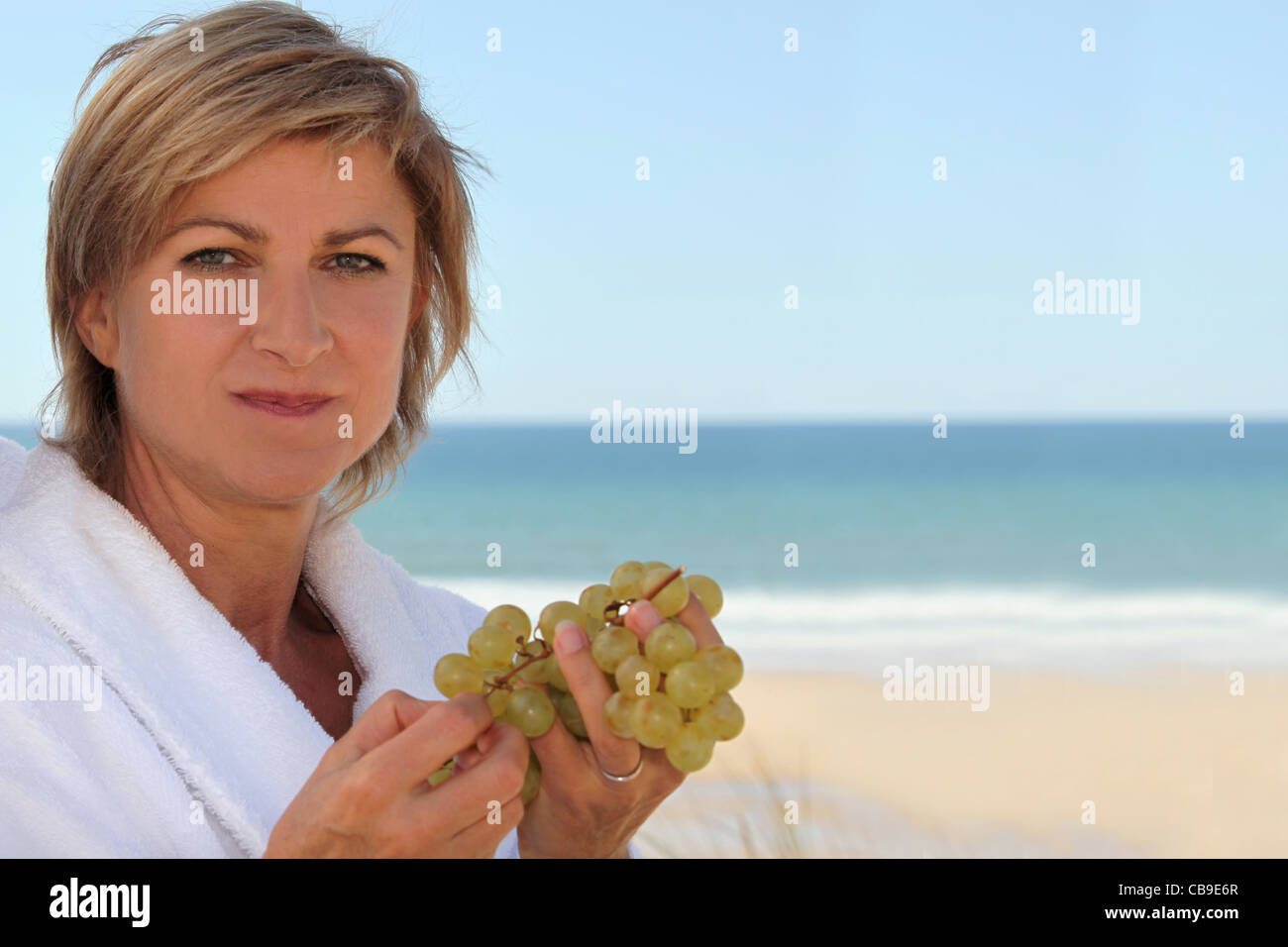 mid aged woman near the sea Stock Photo