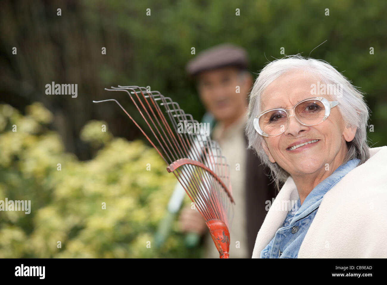 Older couple gardening Stock Photo - Alamy