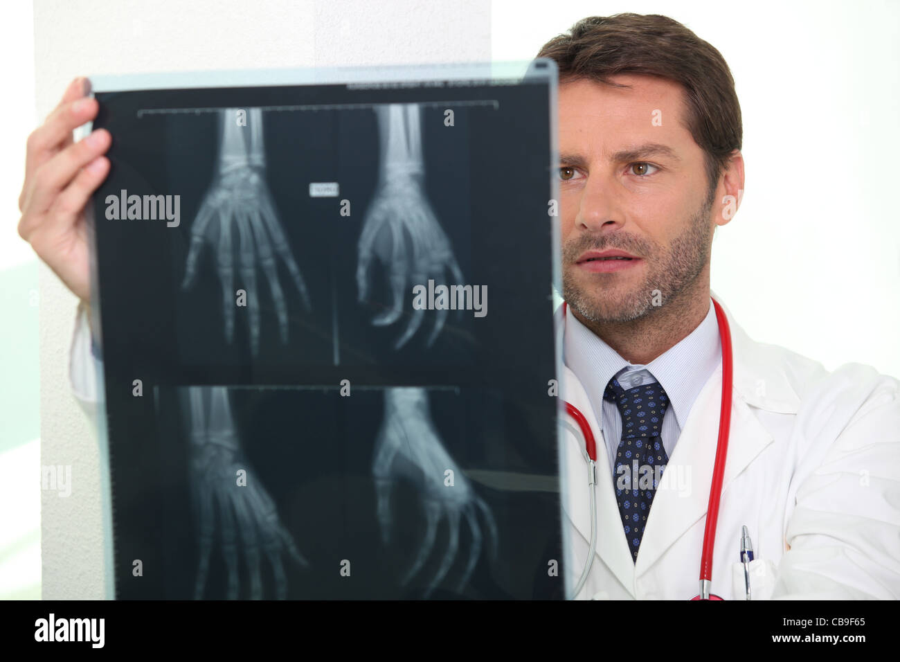 Doctor looking at X-ray Stock Photo