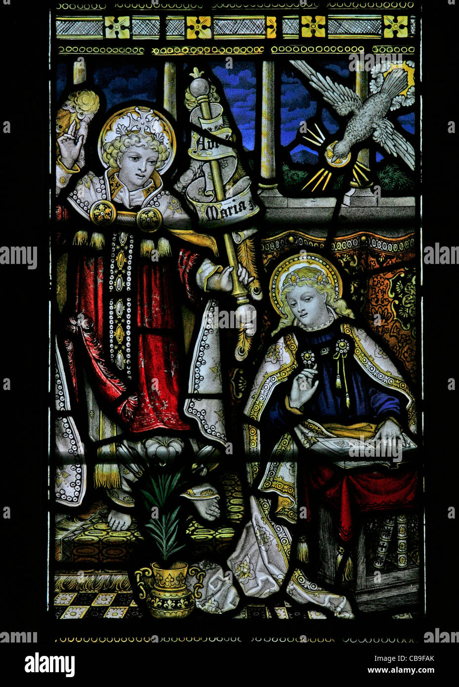Stained glass window by the Kempe Studios depicting The Annunciation, St Etheldreda's Church, West, Quantoxhead, Somerset, England Stock Photo