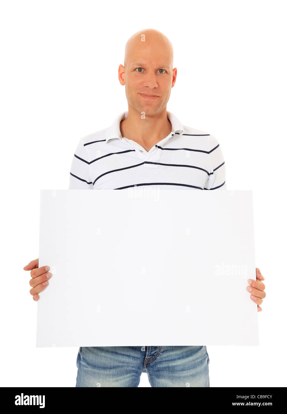 Attractive young man holding blank white sign. All on white background. Stock Photo