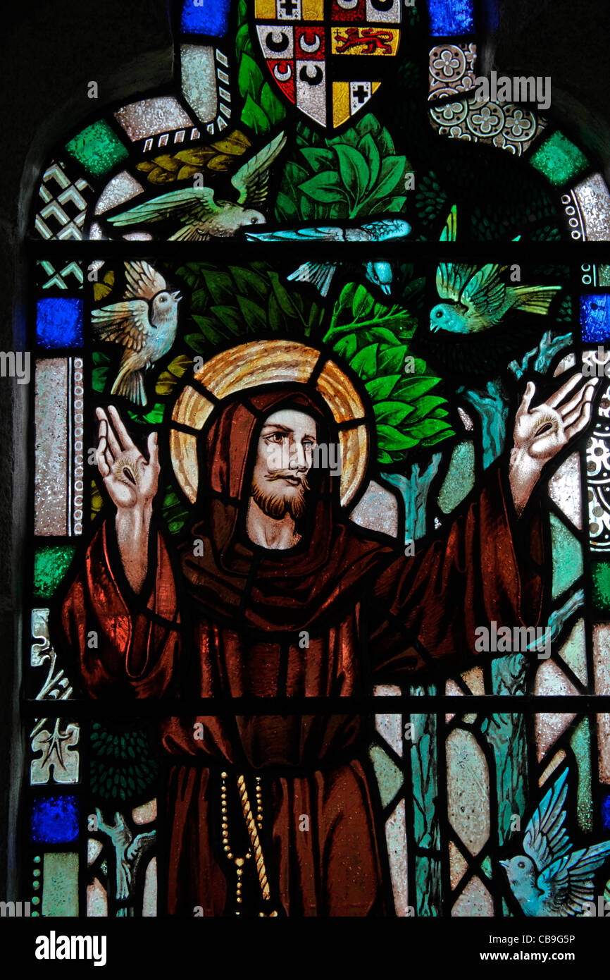 A stained glass window by George Cooper Abbs depicting St Francis of Assisi, Temple Church, Temple, Bodmin Moor, Cornwall Stock Photo