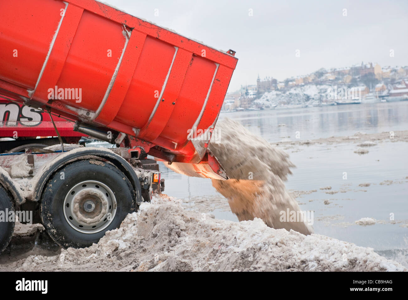 Dumping of snow in the water, Stockholm, Sweden Stock Photo