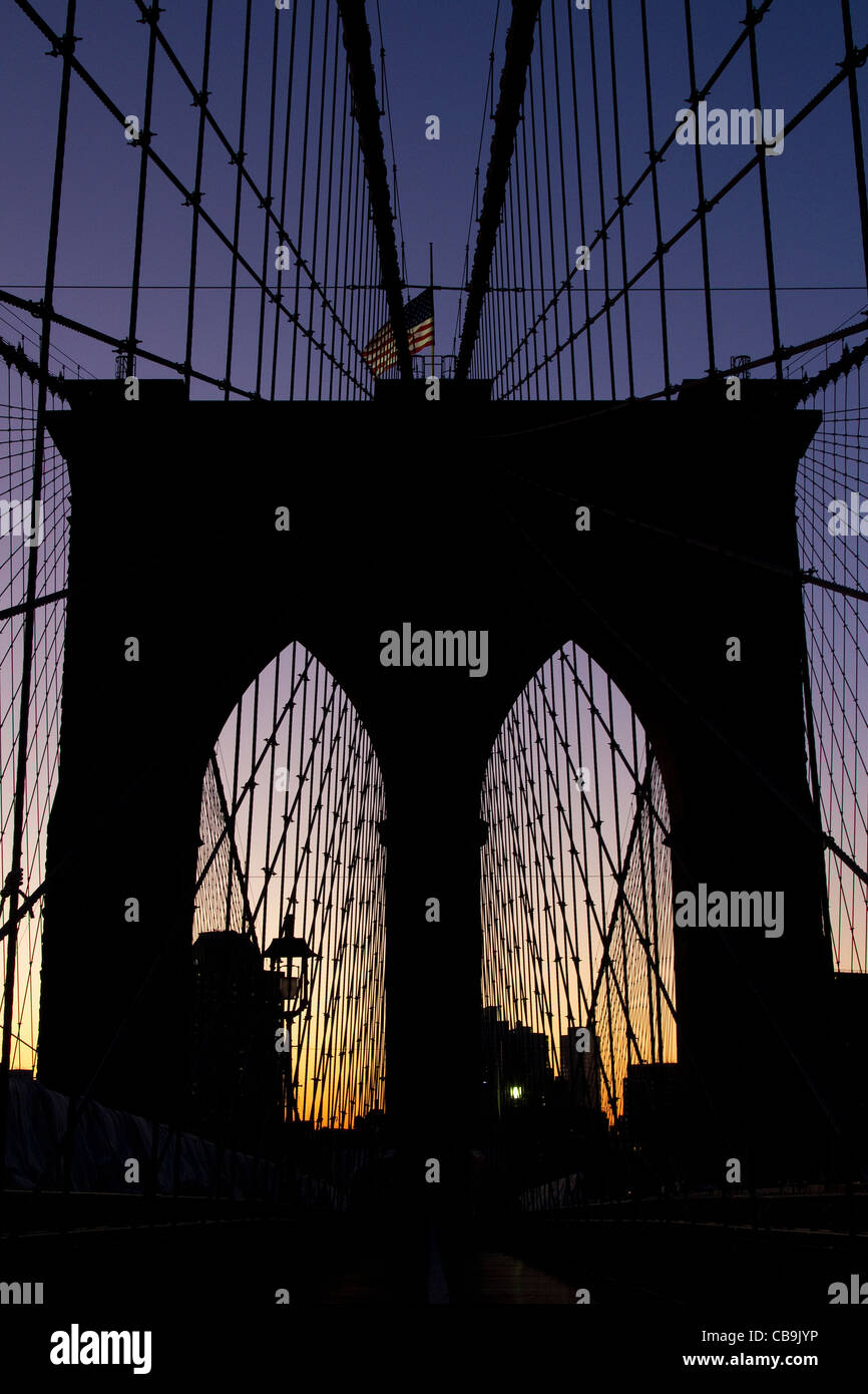 New York City, Brooklyn Bridge during the beautiful colors of early morning sunrise. Stock Photo
