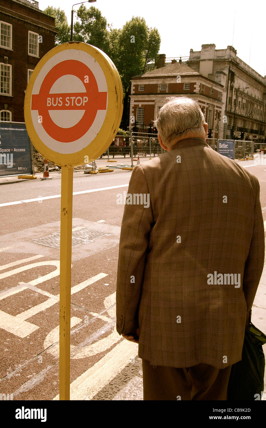 London bus stop waiting hi-res stock photography and images - Alamy