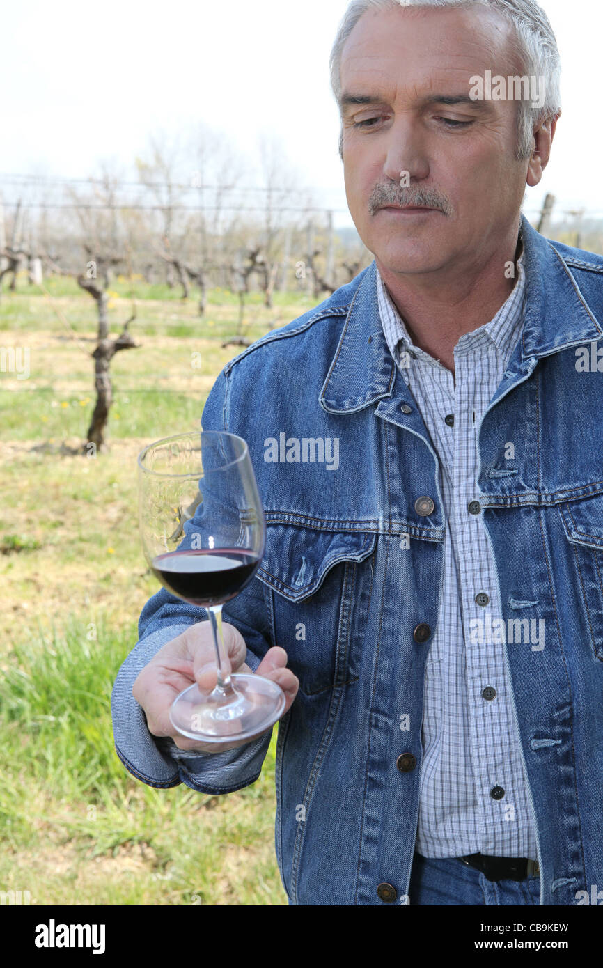 Man tasting red wine Stock Photo - Alamy