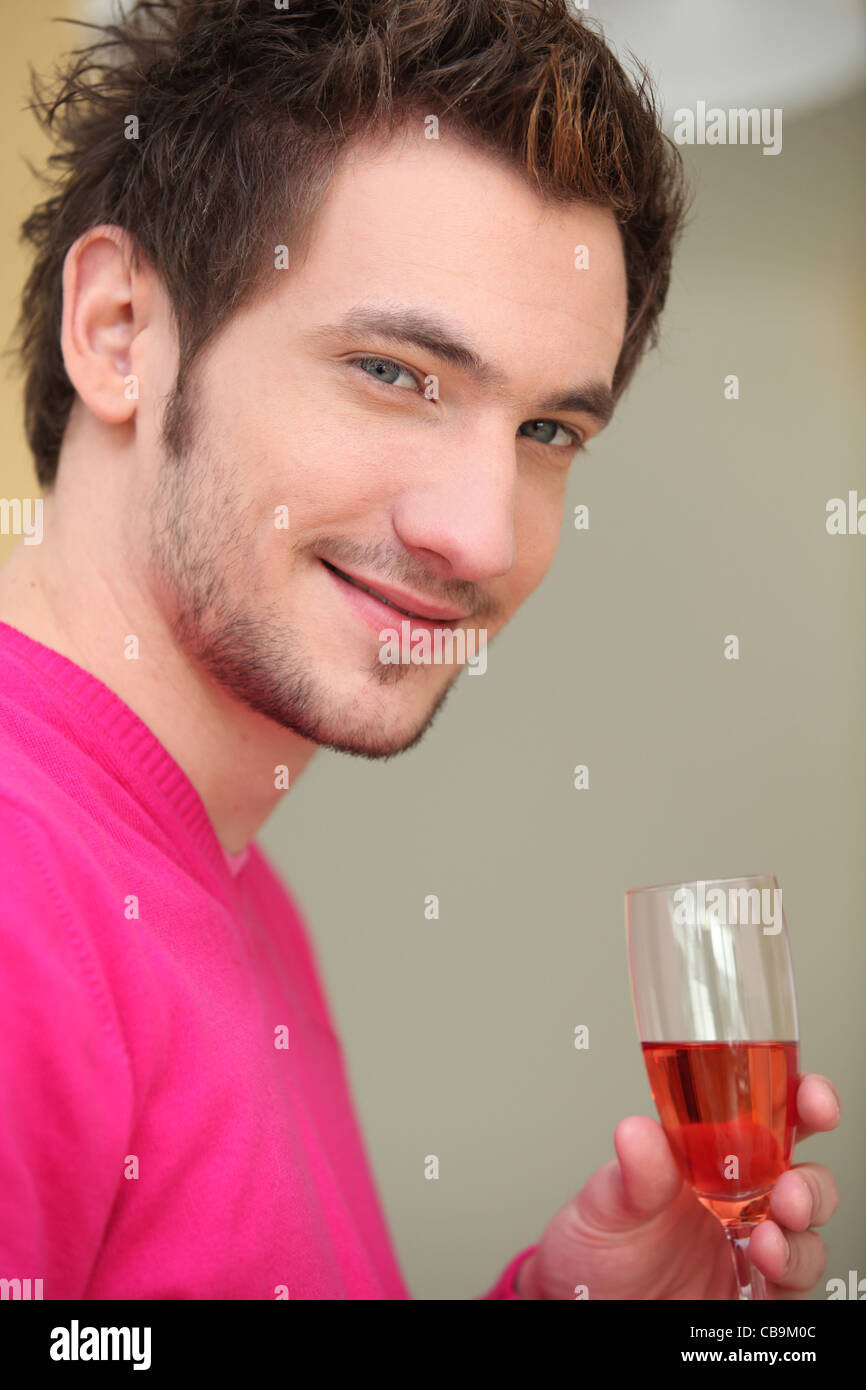 young man drinking wine Stock Photo - Alamy