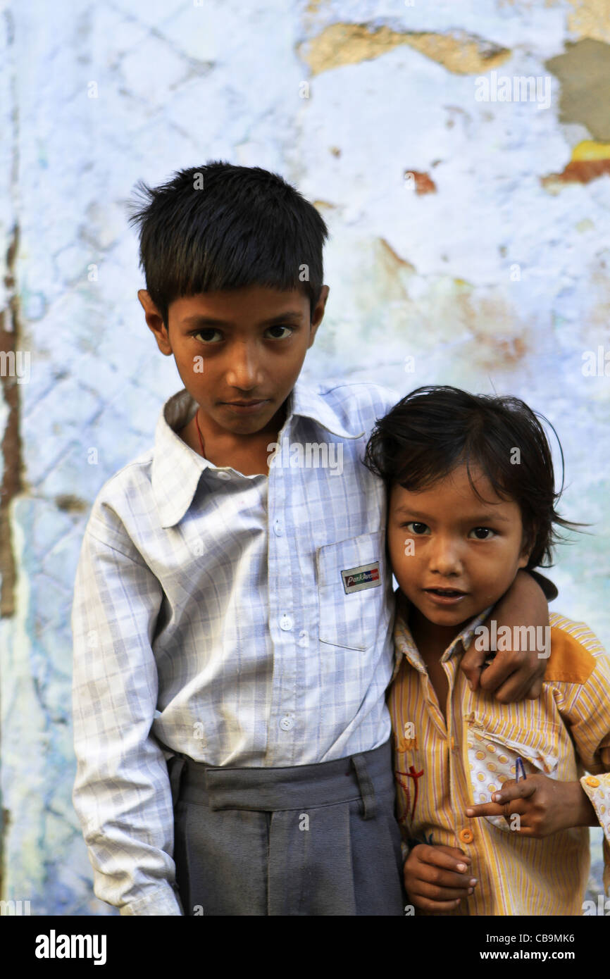 2 shy Indian boys on the street in Pushkar, Rajasthan. India Stock Photo