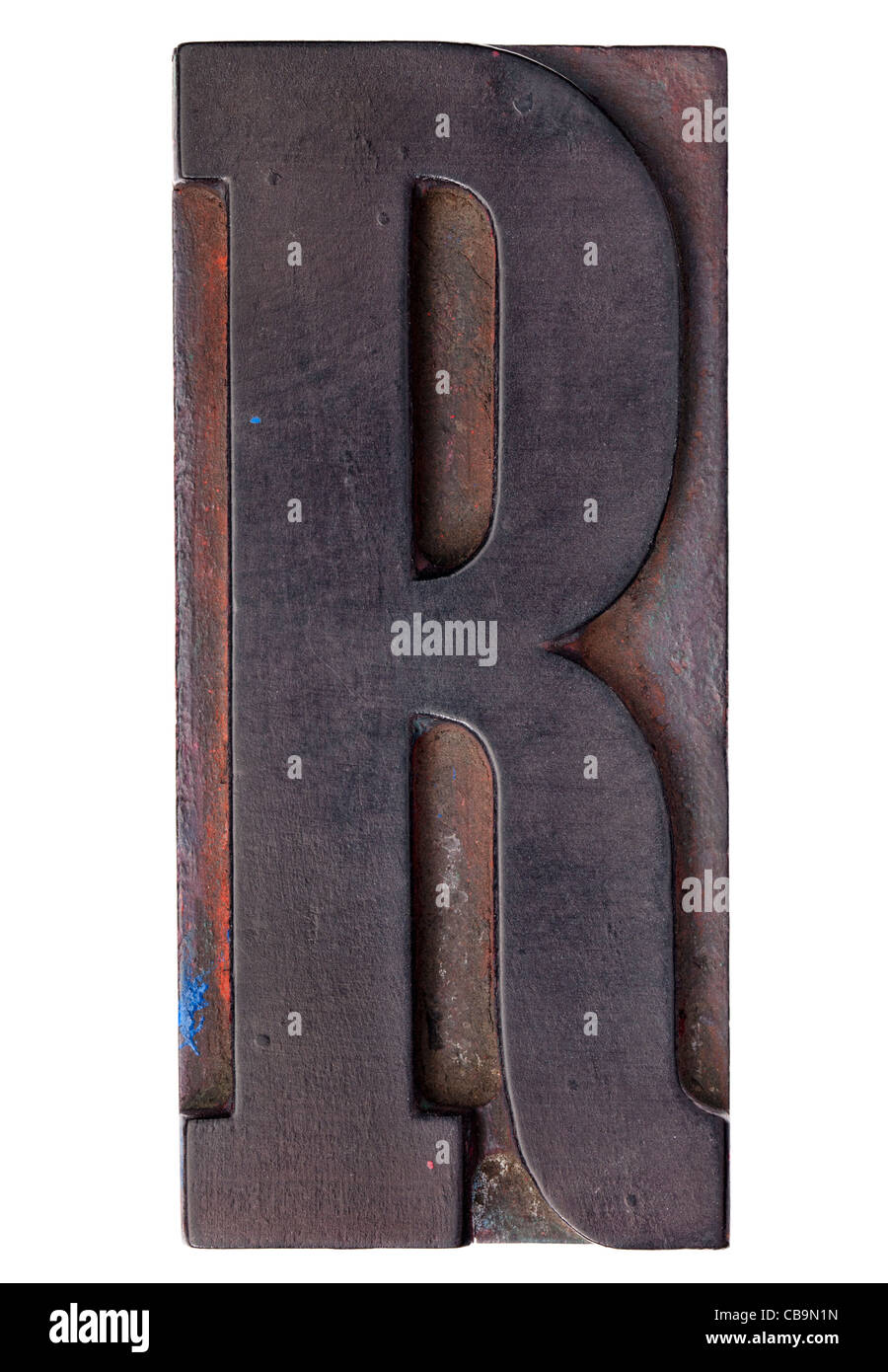 letter R - isolated antique wood letterpress printing block stained by color inks Stock Photo