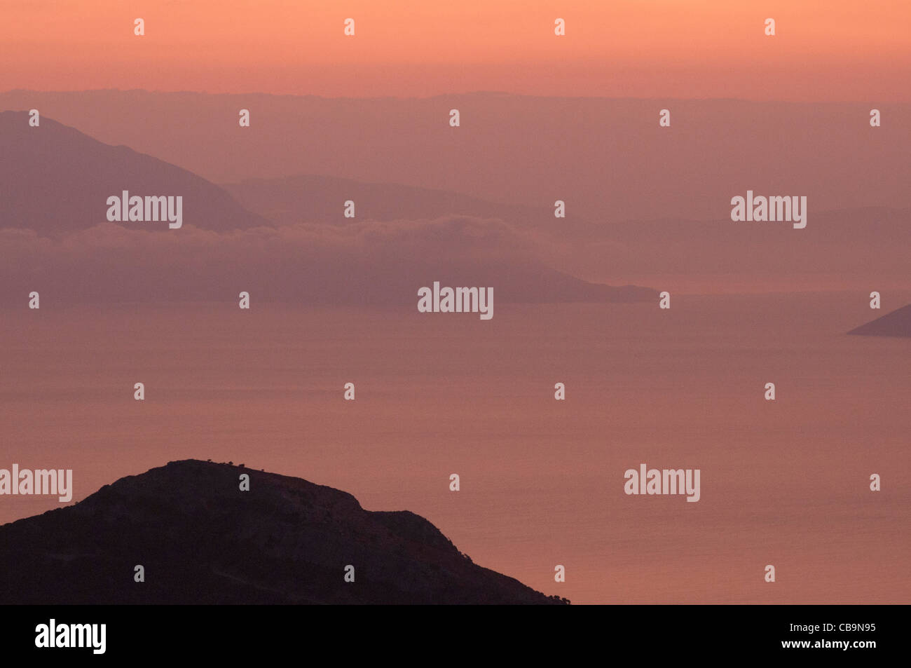 Aegean sea at dawn, showing Ikaria island and Samos, Greece. Stock Photo