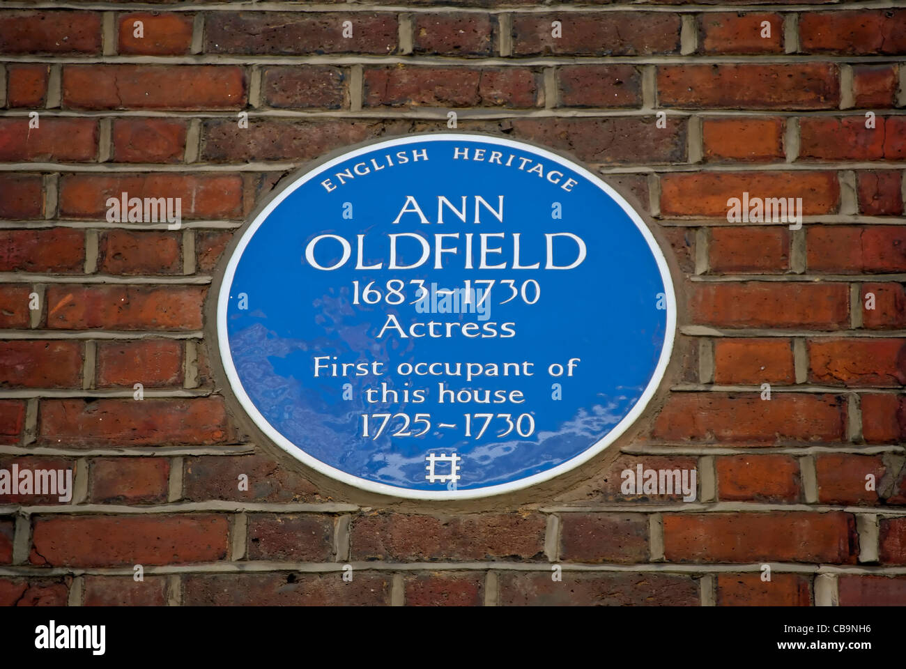 english heritage blue plaque marking a home of actress ann oldfield, grosvenor street, mayfair, london, england Stock Photo