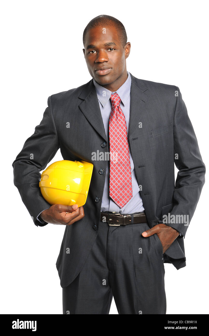 African American businessman holding hardhat isolated over white background Stock Photo