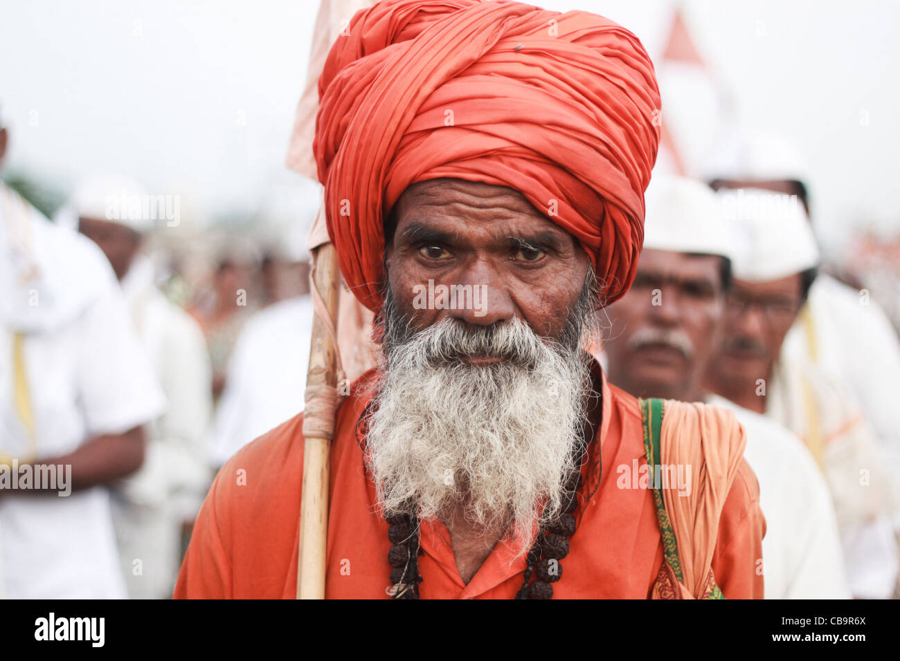 this man is part of  annual dindi , yatra , towards Pandharpur's Vittal mandir, the group walks from Pune almost 25 days . Stock Photo