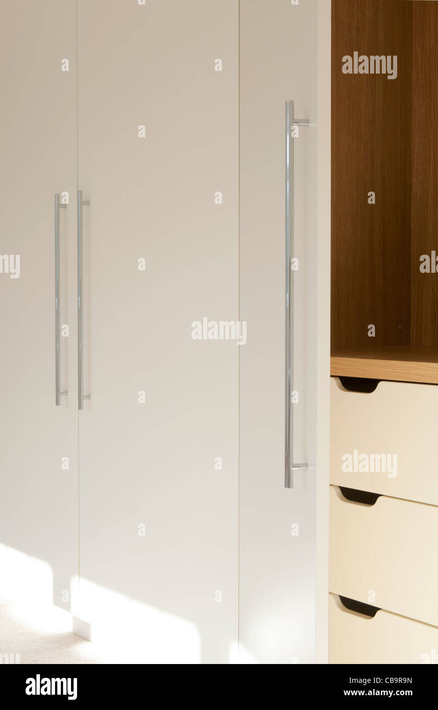White Wardrobe Detail One Door Open And Drawers Inside Stock