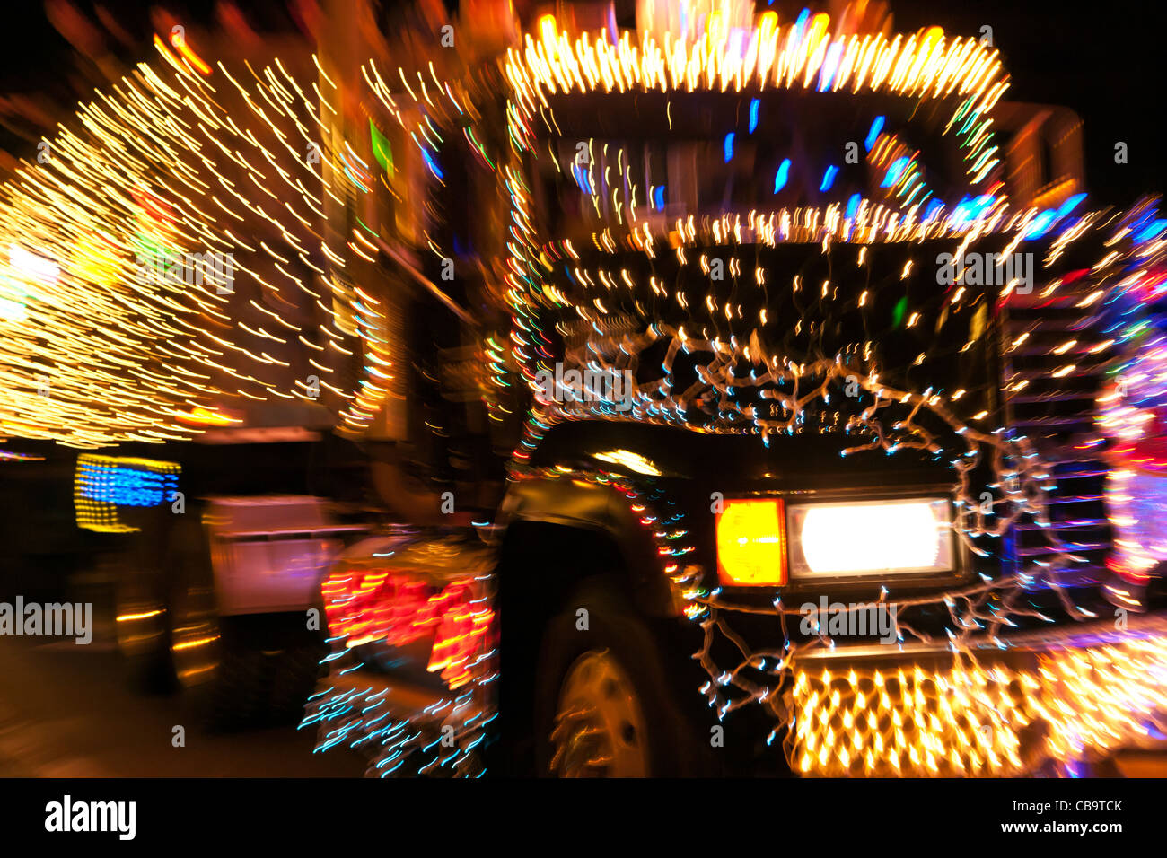 2011 Annual Christmas lighted truck parade through downtown Victoriia-Victoria, British Columbia, Canada. Stock Photo