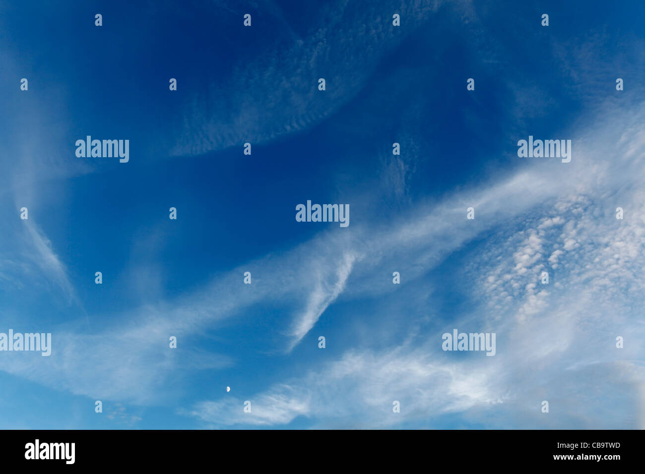 Wispy cloud in summer sky Stock Photo