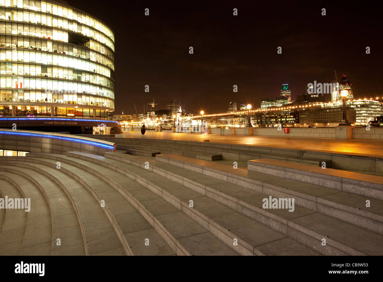 City of London along the river Thames at night Stock Photo