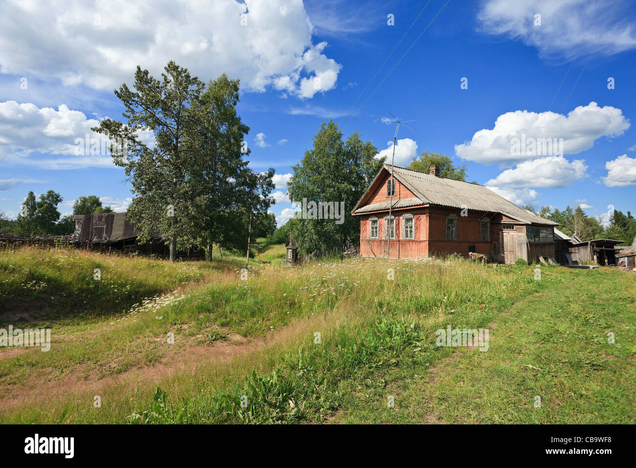 Old wooden house in russian village Stock Photo - Alamy