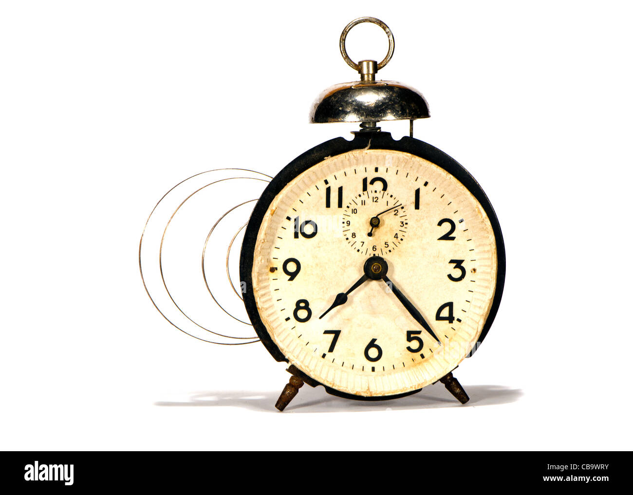 isolated on white ancient alarmclock and mainspring Stock Photo Alamy