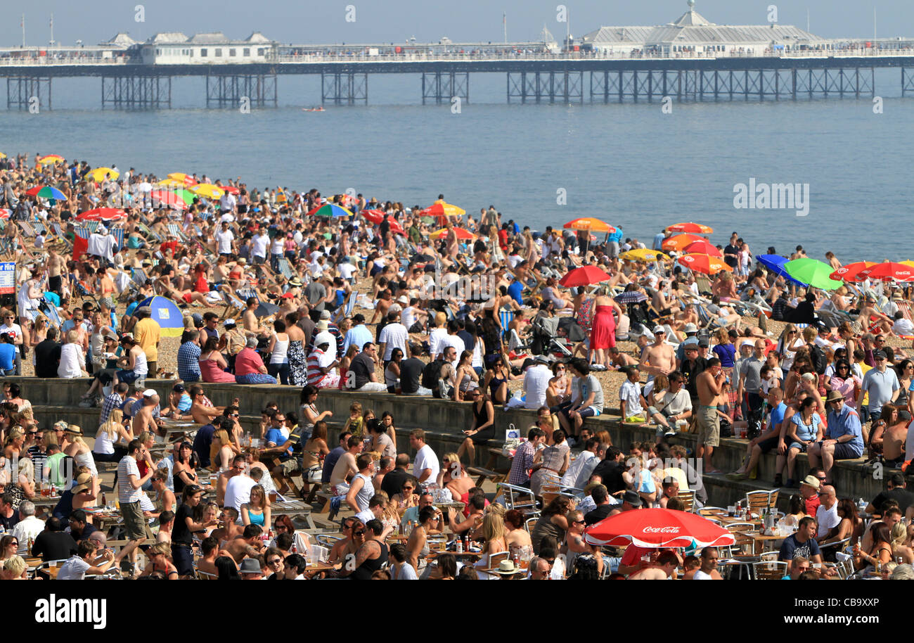 Brighton beach crowded on a summer day Stock Photo