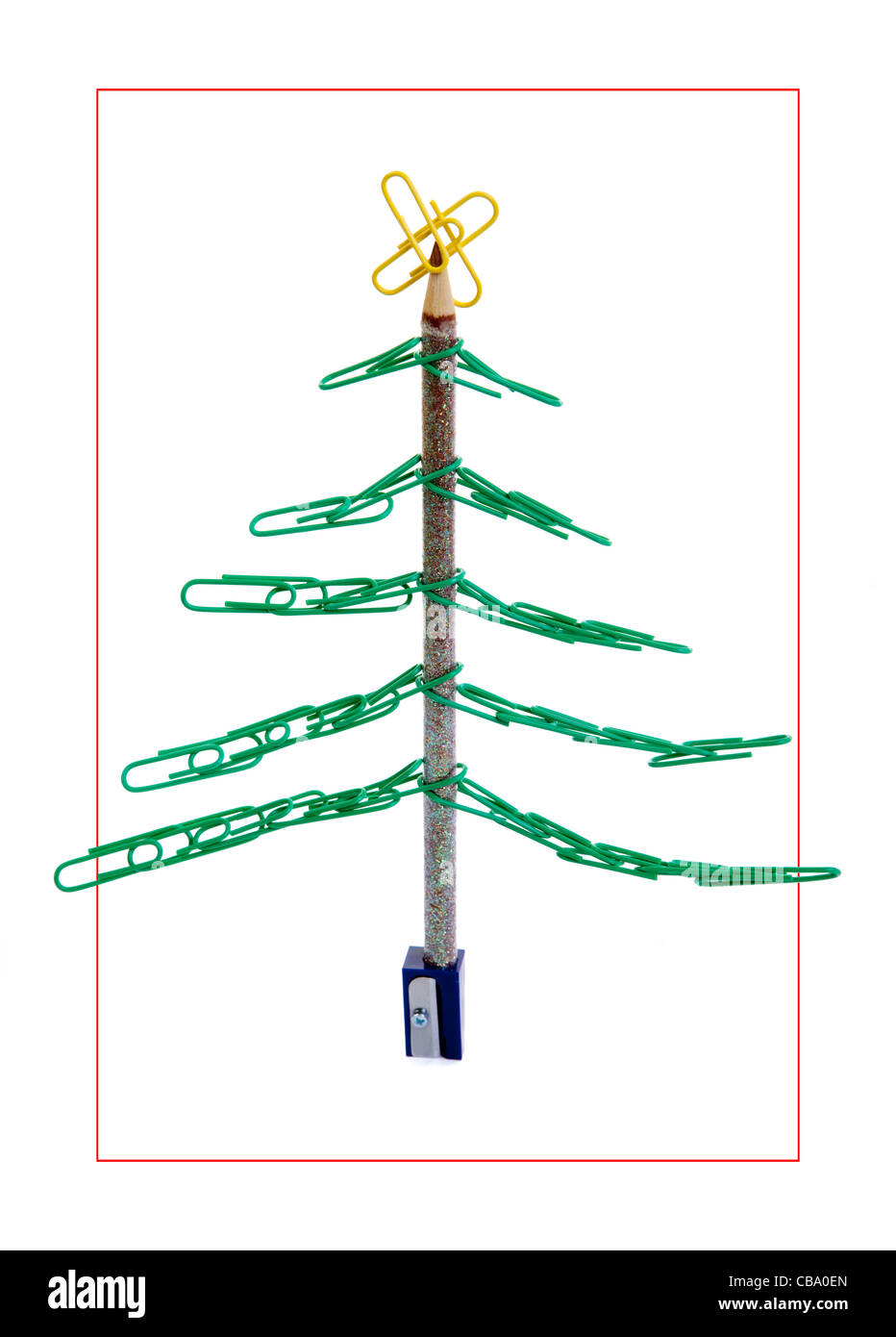 Office Christmas Tree, made out of a pencil sharpener a coloured pencil and a lot of paper clips Stock Photo