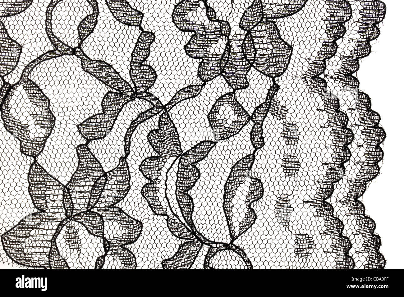 Closeup Of Black Lace On A White Background Stock Photo - Download