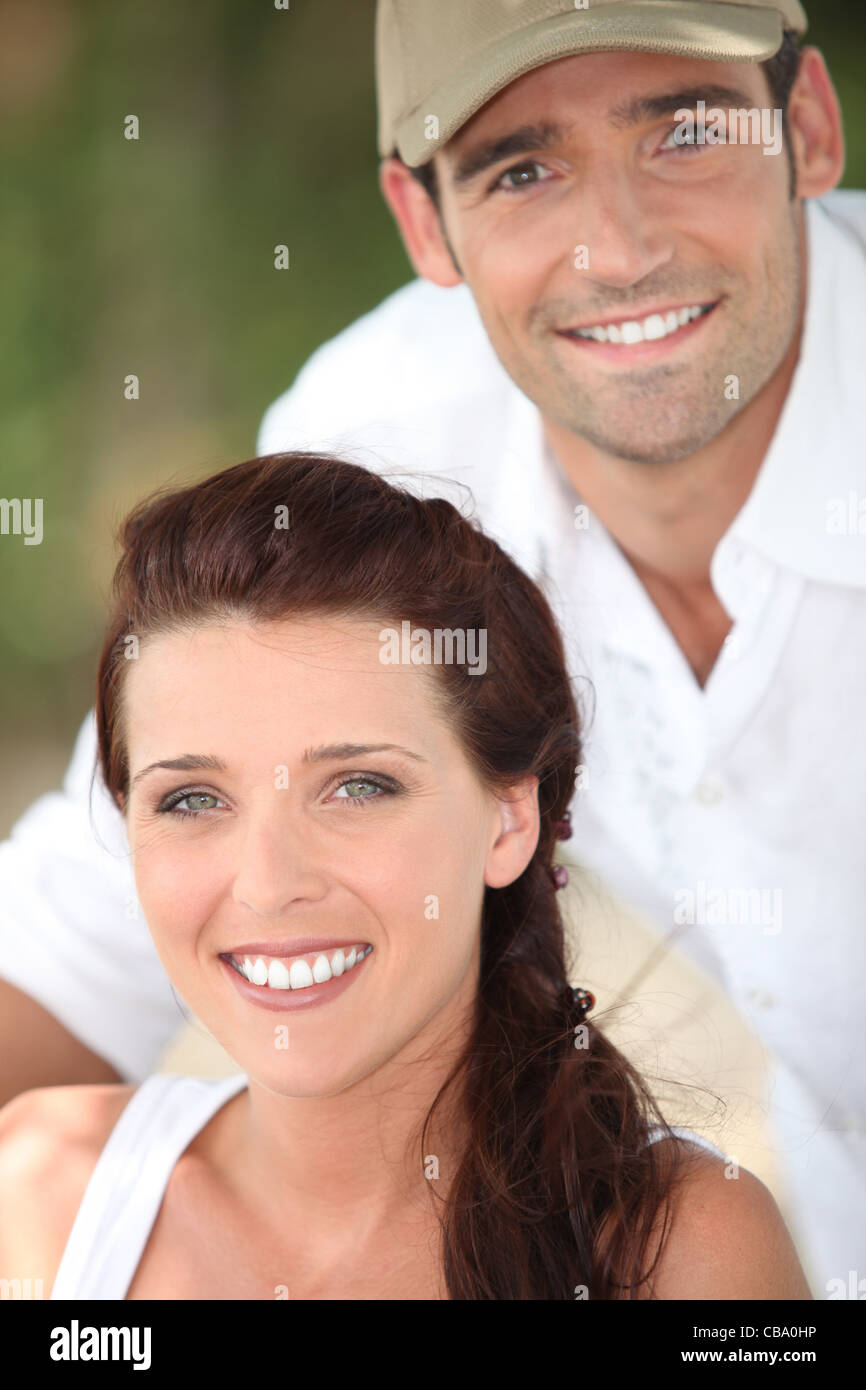 Smiling couple outdoors Stock Photo - Alamy