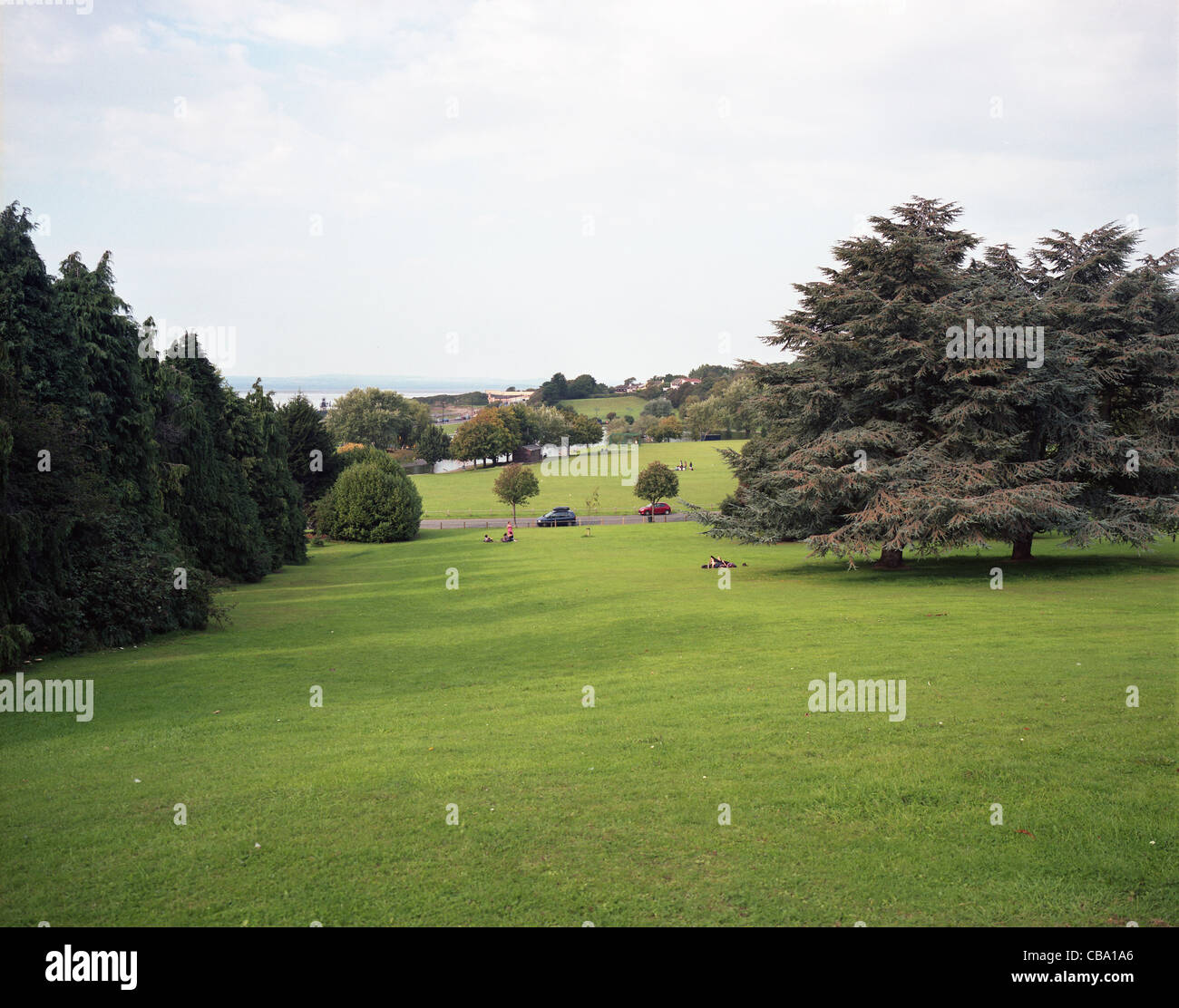 View over Portishead recreation ground towards lake, North Somerset, UK
