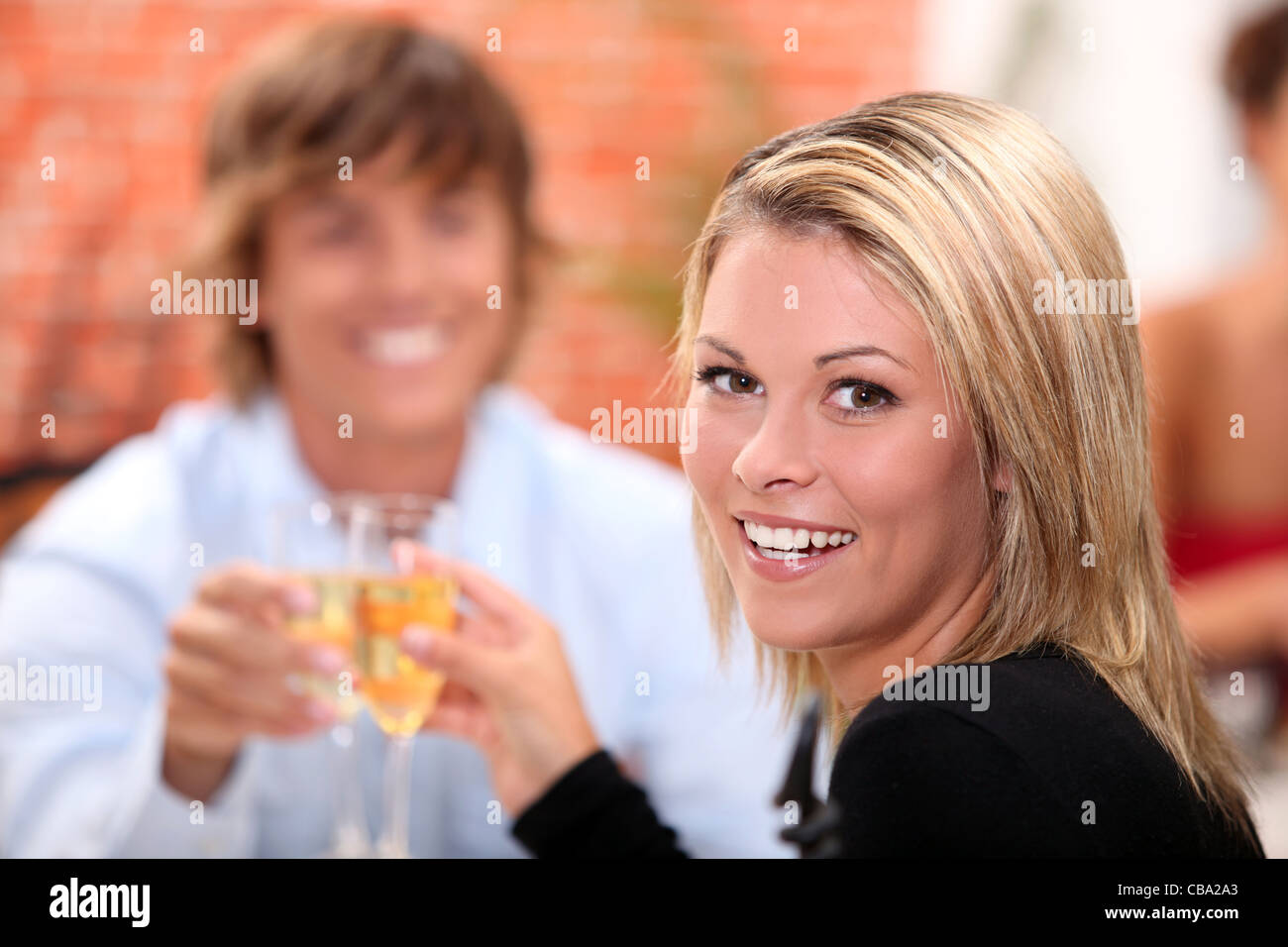 portrait of a woman toasting Stock Photo Alamy