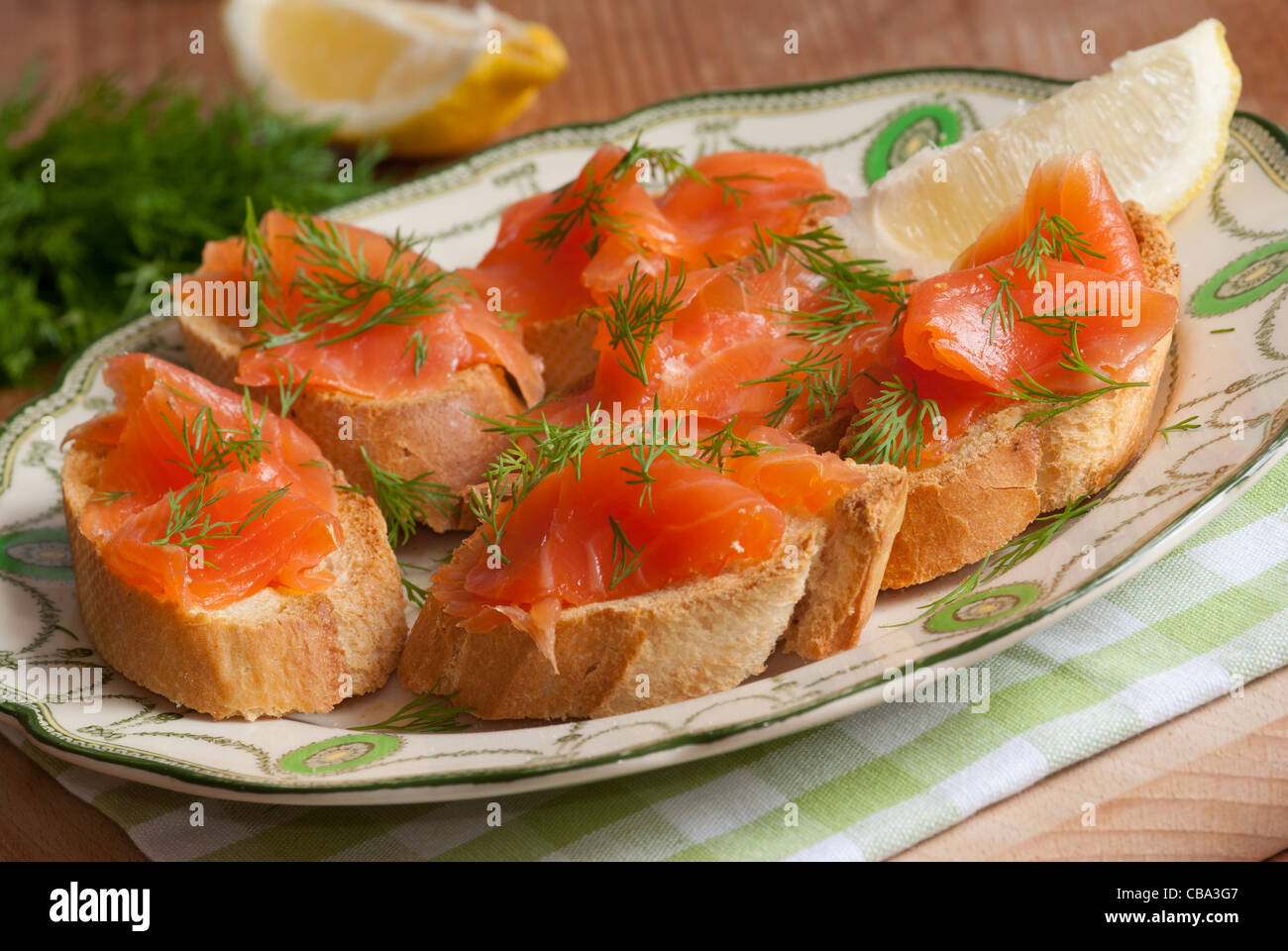 Smoked salmon canapes on a plate Stock Photo - Alamy