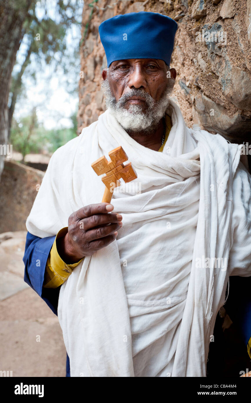 Orthodox Christian priest at the gate-house of Debre Berhan Selassie Church in Gonder, Northern Ethiopia, Africa. Stock Photo