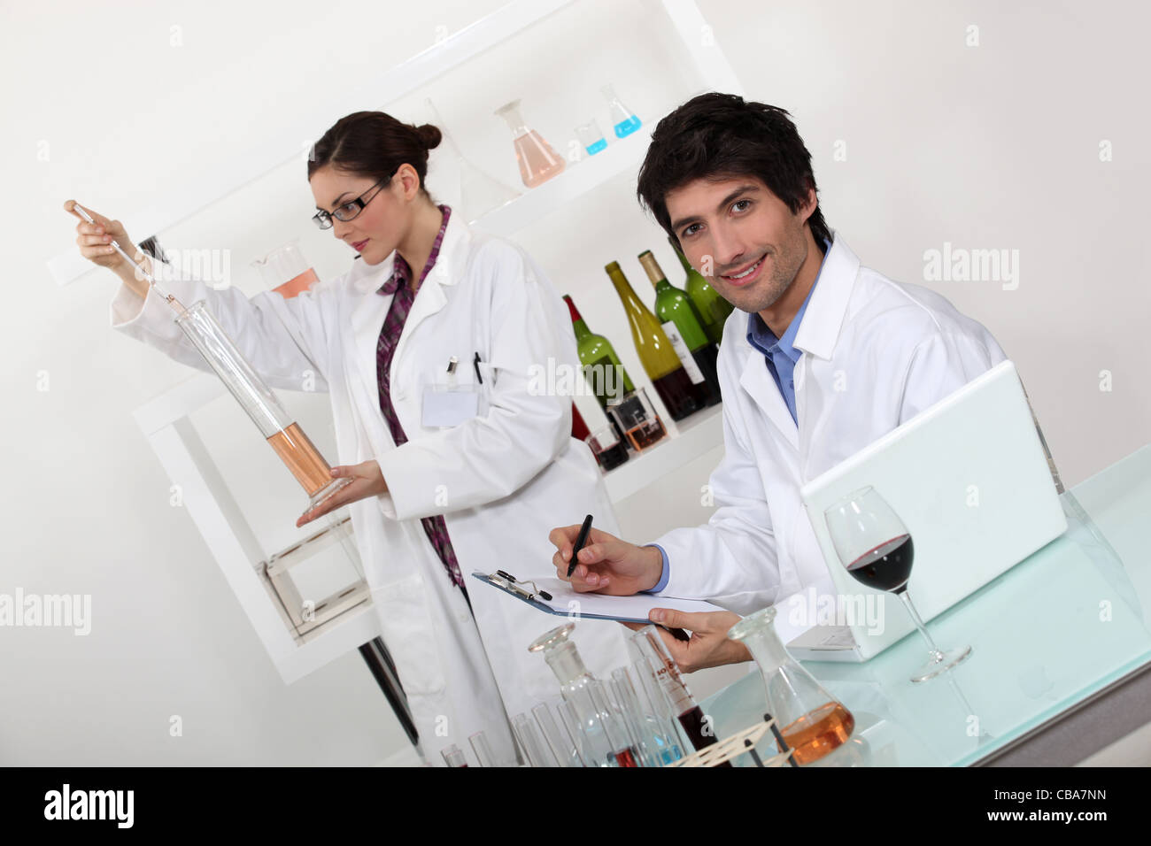 female and male wine laboratory technicians Stock Photo Alamy