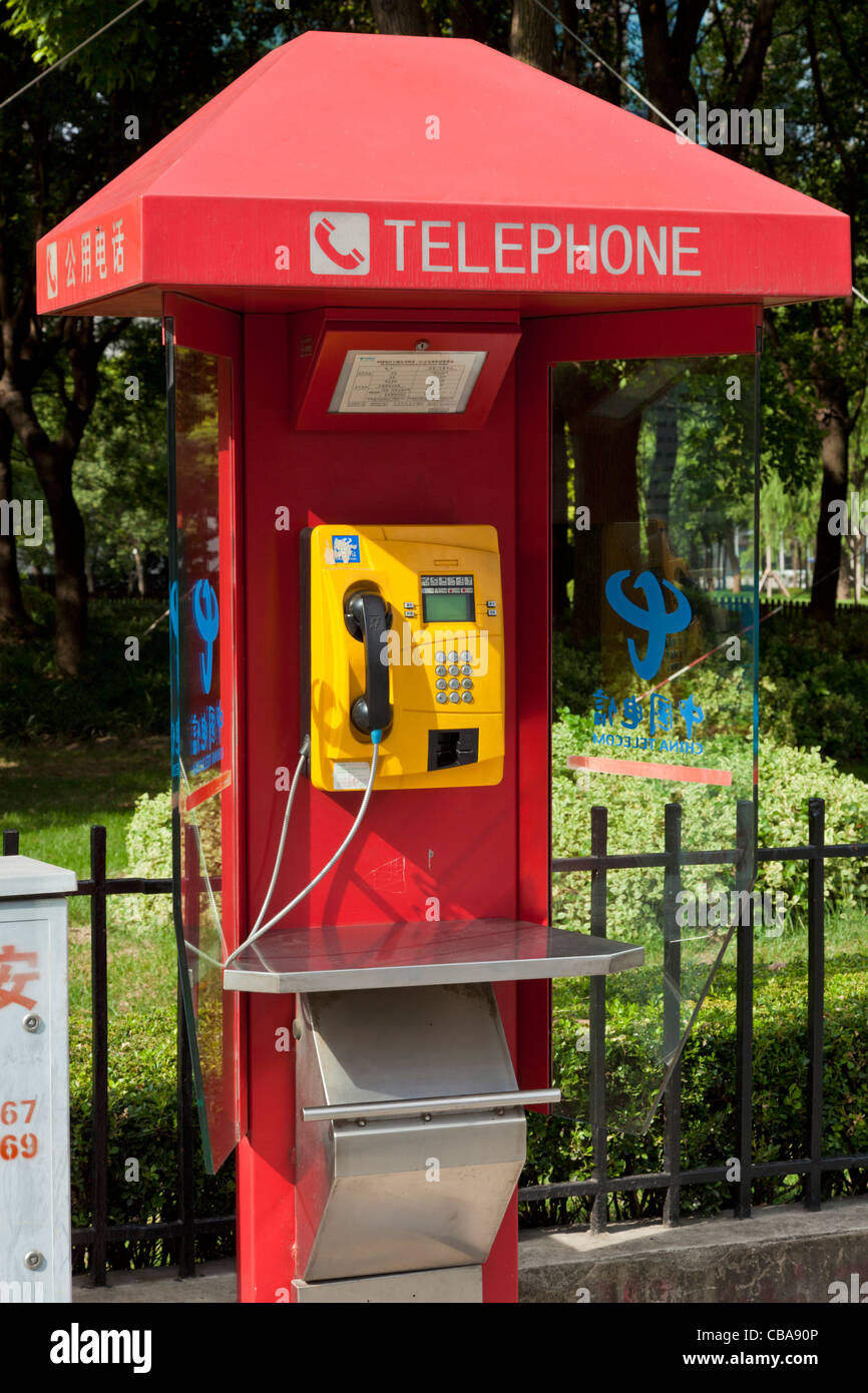 Red chinese public telephone kiosk Shanghai PRC, People's Republic of China, Asia Stock Photo