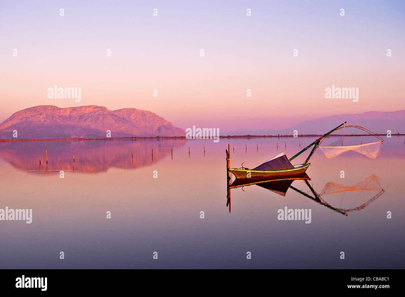 Traditional wooden fishing boat in the lagoon of Messolonghi, Greece Stock Photo