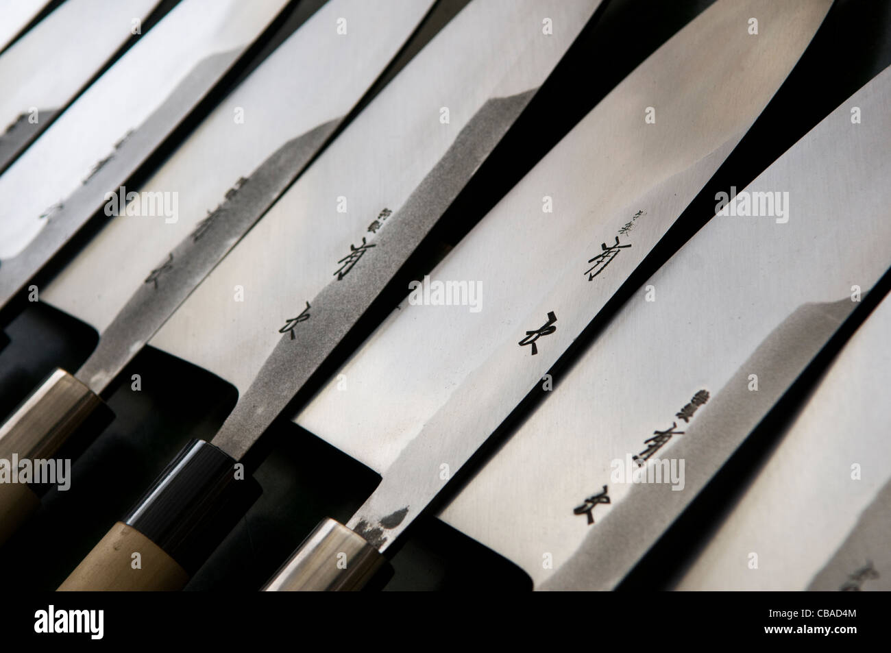 Steel knives for sale at Tsukiji fish market Tokyo Japan Stock Photo