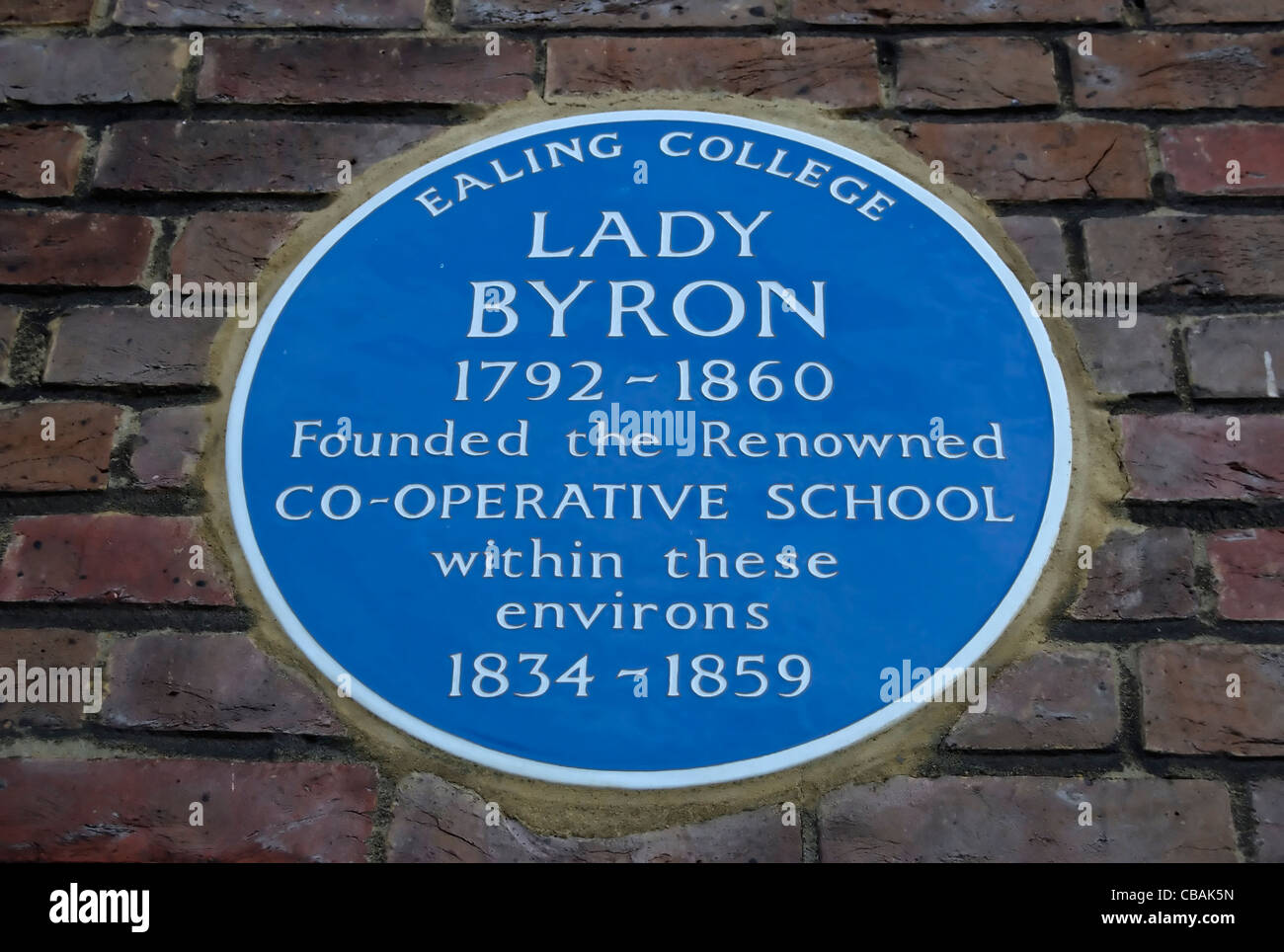 blue plaque marking the site, at what is now ealing college, of the co-operative school, founded in 1834 by lady byron Stock Photo