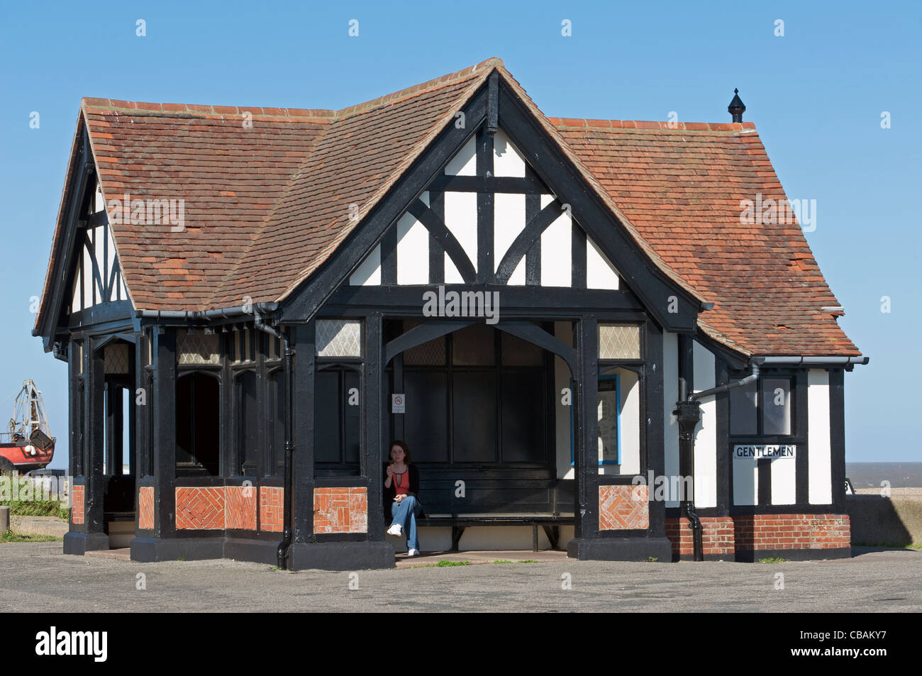 Wood-framed shelter with public toilets, Aldeburgh, Suffolk, UK. Stock Photo