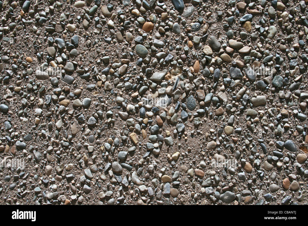 washed rounded pebble concrete background Stock Photo Alamy