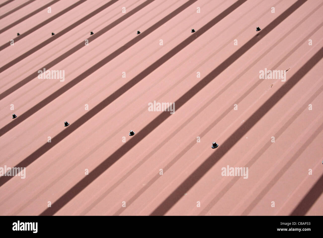 red metal roof background with diagonal panels Stock Photo