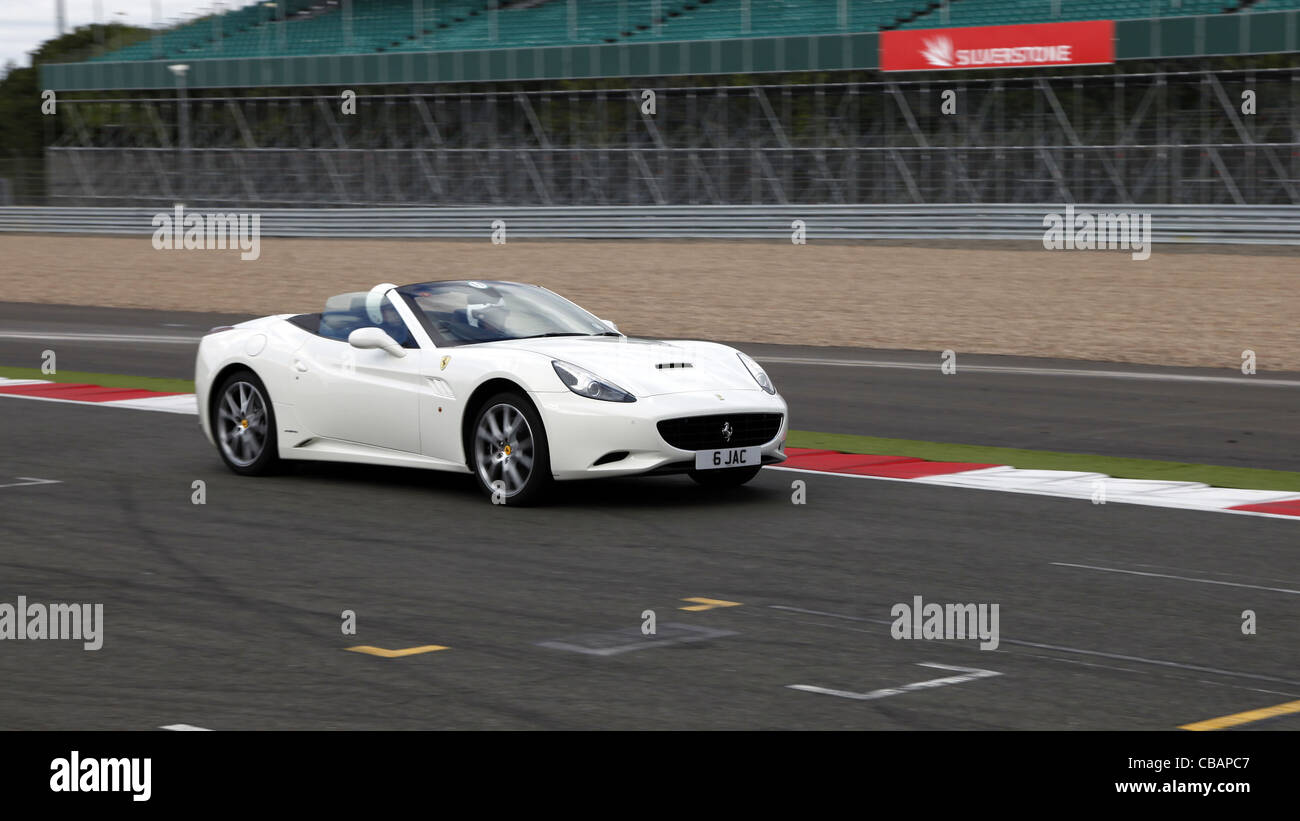 WHITE FERRARI CALIFORNIA CAR SILVERSTONE CIRCUIT ENGLAND 14 September 2011 Stock Photo