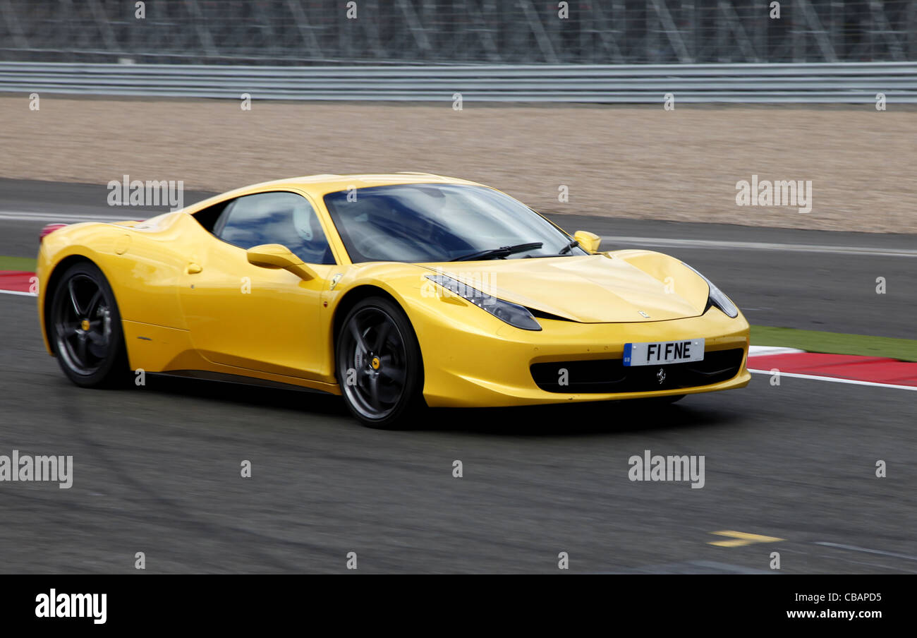 YELLOW FERRARI 458 ITALIA CAR SILVERSTONE CIRCUIT ENGLAND 14 September 2011 Stock Photo