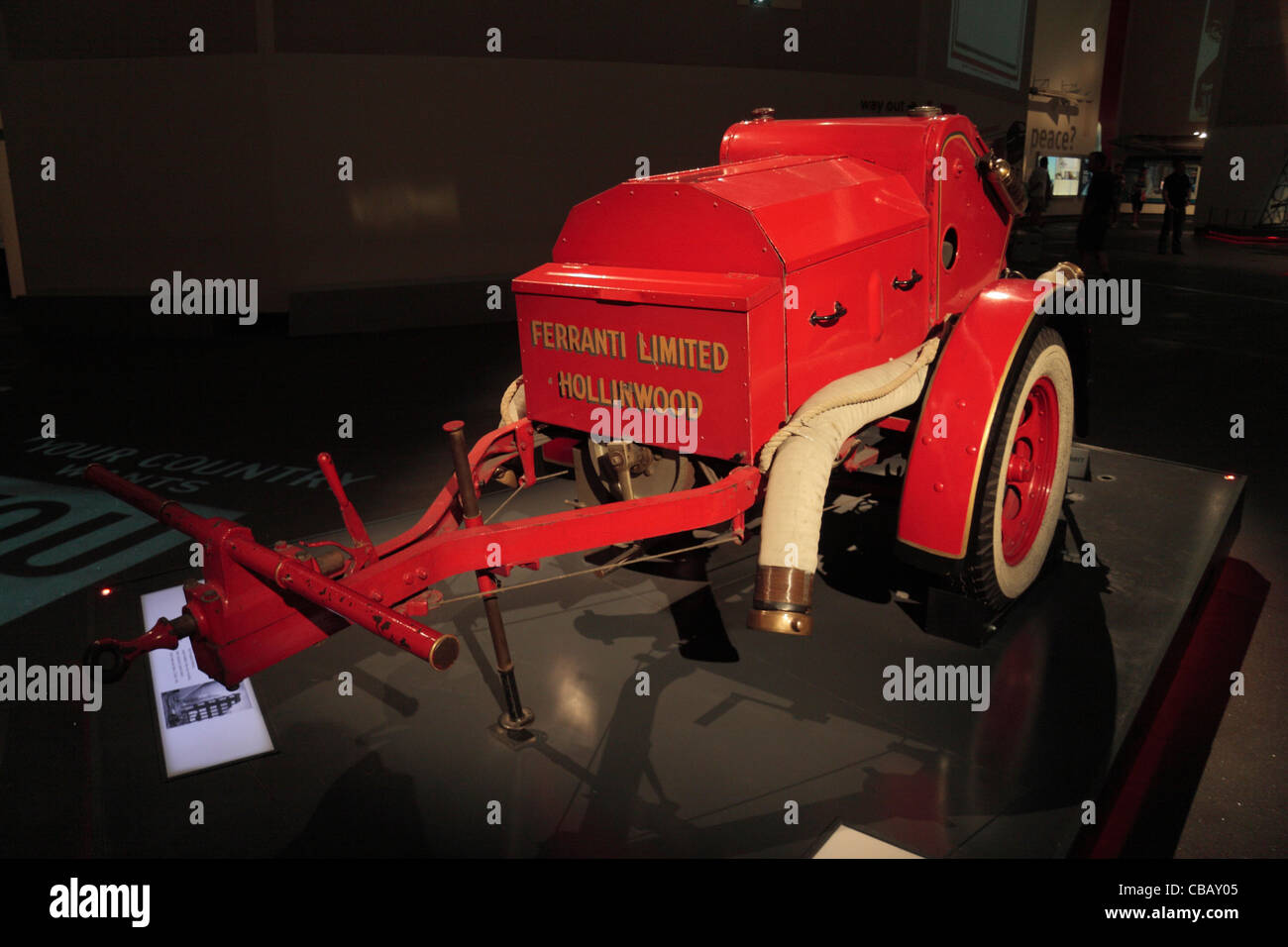 A Dennis fire fighting trailer pump, as used in WWII, on display at the Imperial War Museum North, Salford Quays, Manchester, UK Stock Photo