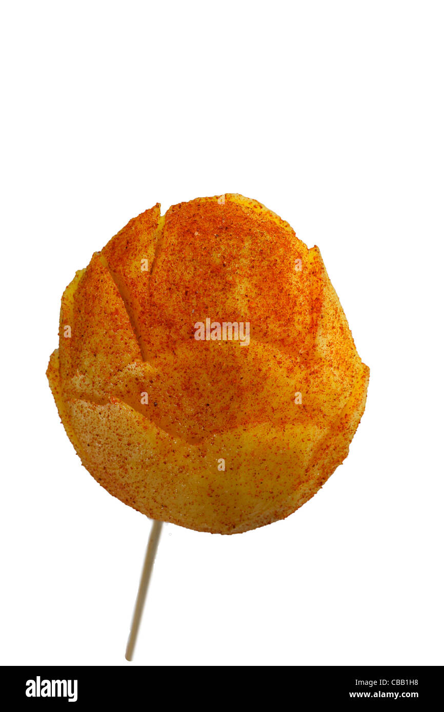 mango on a stick with cayenne pepper Stock Photo Alamy