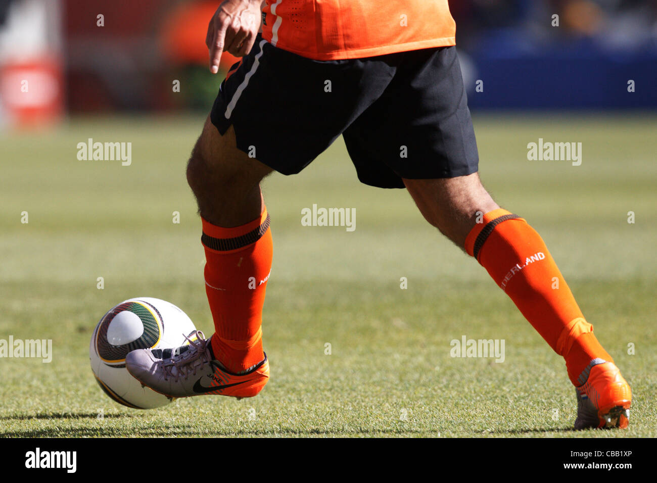 A Dutch player controls the ball during a 2010 FIFA World Cup match against Denmark at Soccer City Stadium on June 14, 2010. Stock Photo